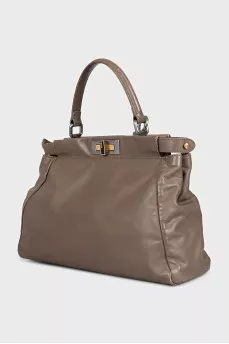 Leather bag with twist lock