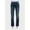 Men's straight-leg jeans with a distressed effect