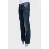 Men's straight-leg jeans with a distressed effect