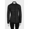 Black quilted jacket with buttons