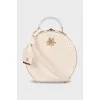 Round embossed leather bag