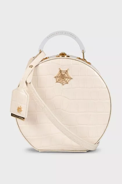 Round embossed leather bag