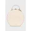 Round embossed leather bag