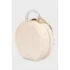 Round embossed leather bag