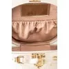 Round embossed leather bag