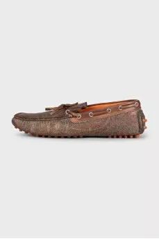 Brown leather moccasins with print