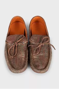 Brown leather moccasins with print