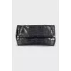 Caiman leather clutch
