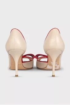 Beige leather shoes with red trim