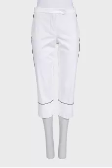 White suit with cropped trousers
