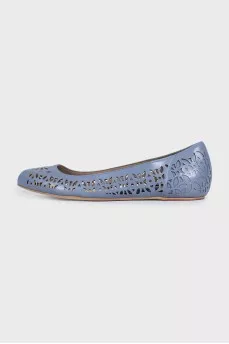 Ballet flats decorated with perforations