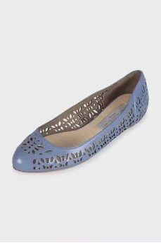 Ballet flats decorated with perforations