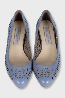 Ballet flats decorated with perforations