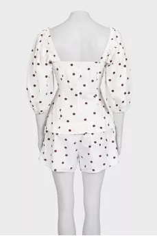 White suit with printed shorts