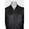Men's black leather jacket with a zipper
