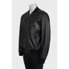 Men's black leather jacket with a zipper