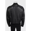 Men's black leather jacket with a zipper
