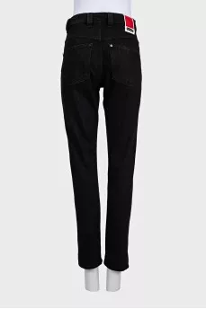Black jeans with an accent jacron
