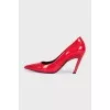 Red patent leather pumps