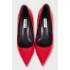Red patent leather pumps