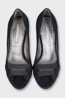 Suede shoes with a conical heel