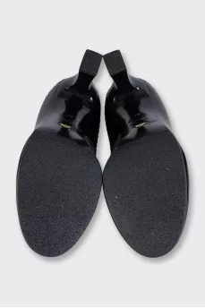 Black leather shoes with perforations