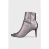 Leather ankle boots with heels and a zipper