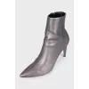 Leather ankle boots with heels and a zipper