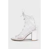 High fishnet heeled sandals