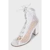 High fishnet heeled sandals
