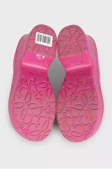 Pink rubber clogs with heels