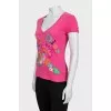 Fitted T-shirt decorated with appliqué