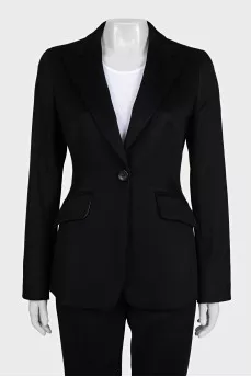 A suit consisting of a fitted jacket and straight trousers