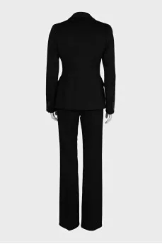 A suit consisting of a fitted jacket and straight trousers