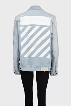 Blue denim jacket with a signature print
