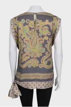Sleeveless silk blouse with print