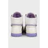 High-top leather sneakers with a contrasting sole