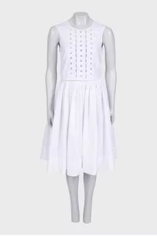 Fitted white dress with perforations