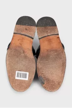 Black leather mules with decoration