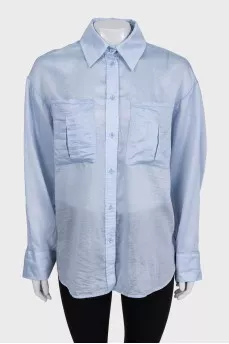 Light blue loose button-down shirt