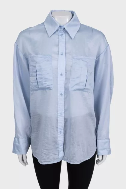 Light blue loose button-down shirt