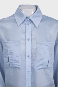 Light blue loose button-down shirt