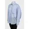 Light blue loose button-down shirt