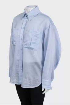 Light blue loose button-down shirt