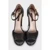 Black leather sandals with a chunky sole
