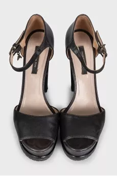 Black leather sandals with a chunky sole