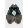 Black leather sandals with a chunky sole