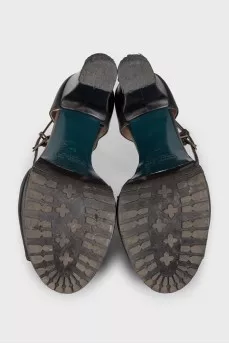 Black leather sandals with a chunky sole