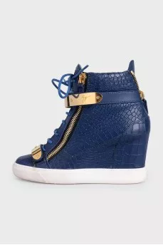 Leather wedge sneakers with embossed detailing