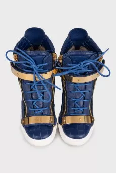 Leather wedge sneakers with embossed detailing